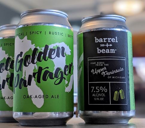 Cans of Golden Partager in the Community Room. 