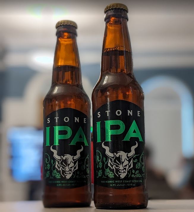Two bottles of Stone IPA in the Community Room. 