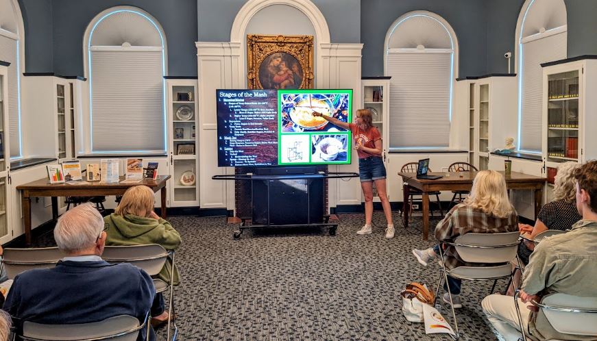 Michelle lecturing our Ale Together Now program in the Community Room. 