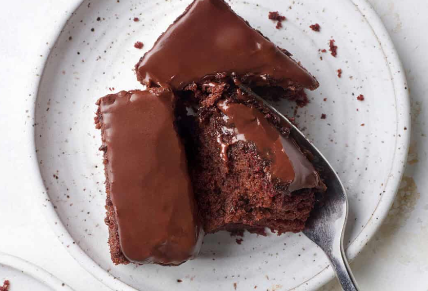 Chocolate cake on a white plate. 