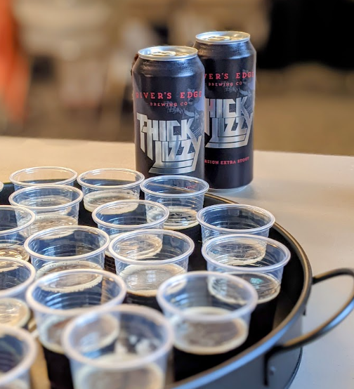 Thick Lizzy beer in the Community Room, with sample pours. 