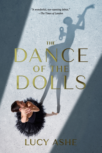 The cover of "The Dance of the Dolls" novel by Lucy Ashe. It features a ballerina in black, with her shadow made to resemble a wind-up doll.