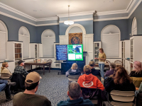 Michelle lecturing our Ale Together Now program in the Community Room. 
