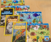 displays 4 puzzles and 3 books-the contents of the animal puzzle kit