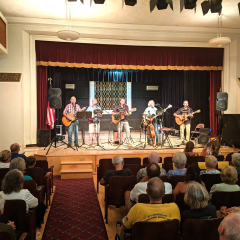 Just Around the Corner playing onstage. 