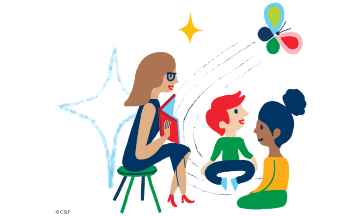 Woman reading a story to children