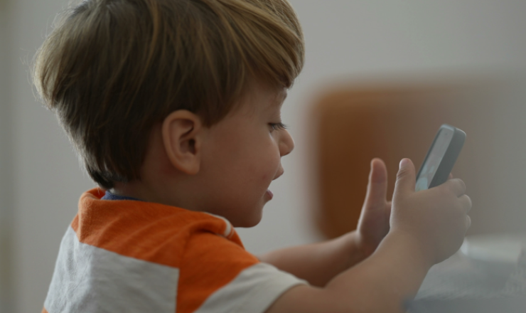 A child using a screen. 
